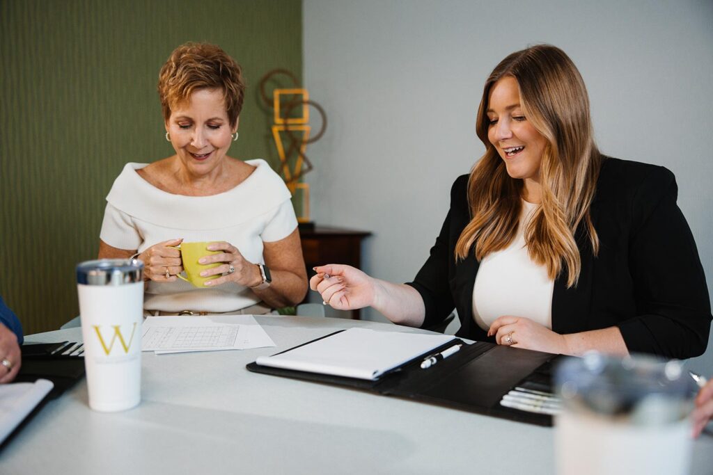 Sheri and Alisha Welsh in a meeting