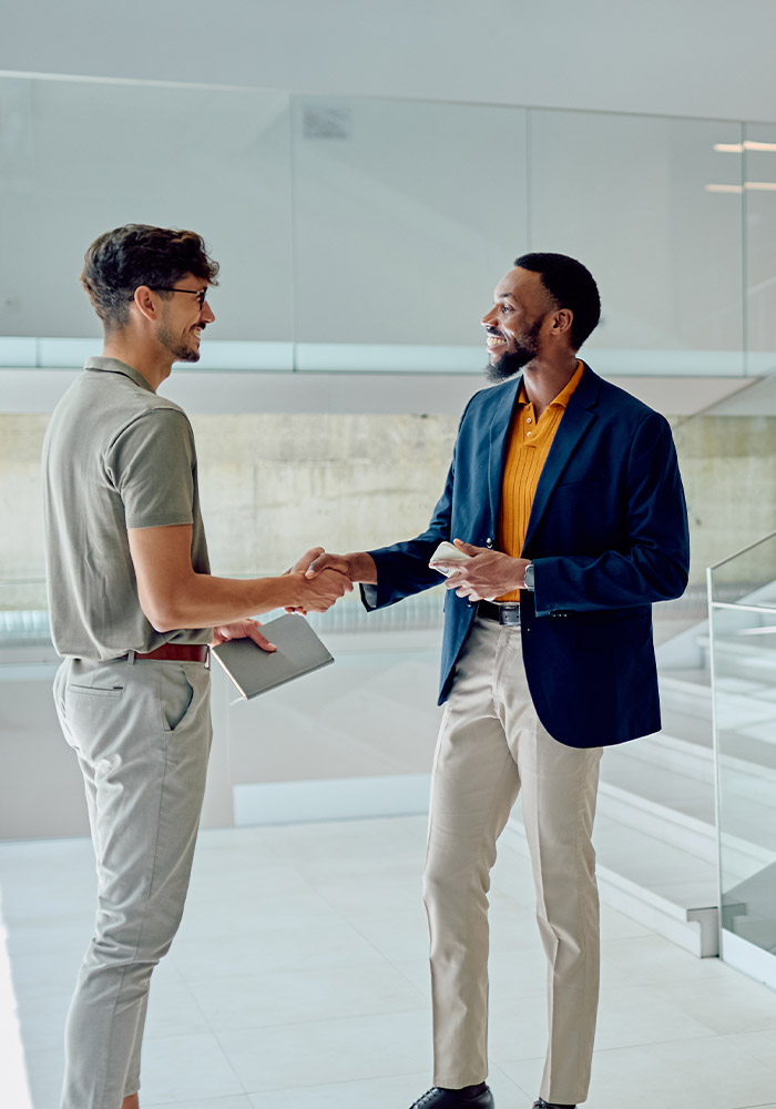 Two professionals shaking hands